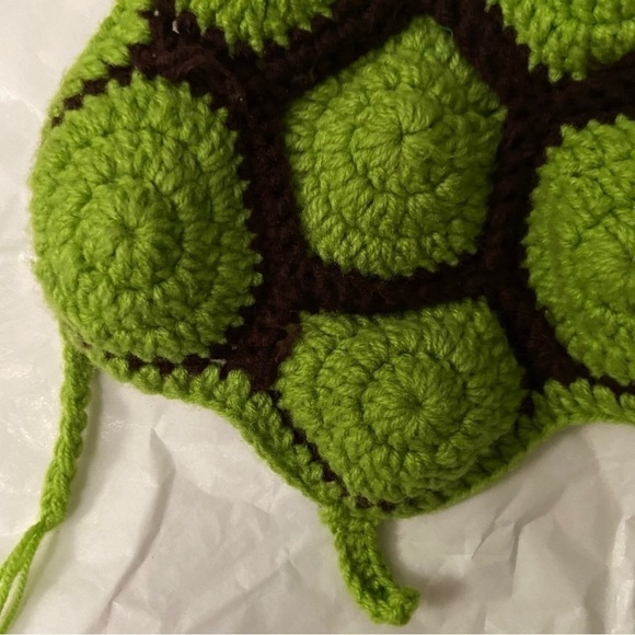 Bundle up baby in handmade turtle costume of knit hat attached to tortoise shell - Picture 3 of 8